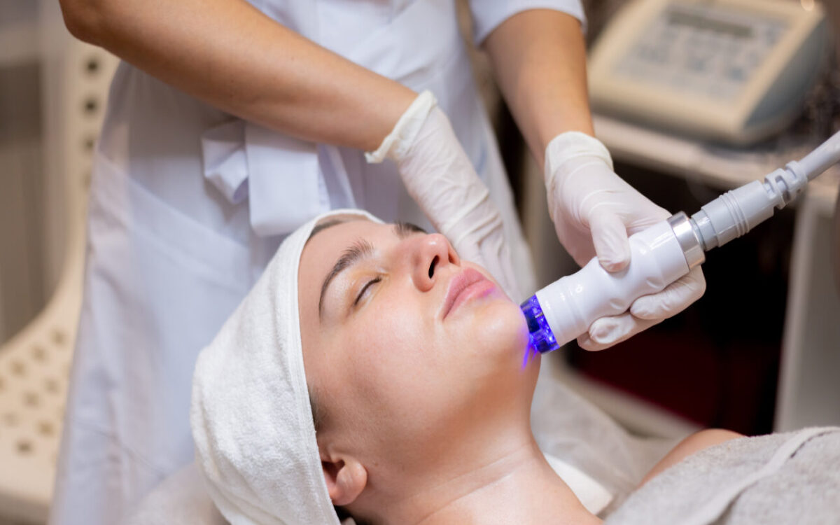 young beautiful girl lies beautician s table receives procedures 1290x750 1
