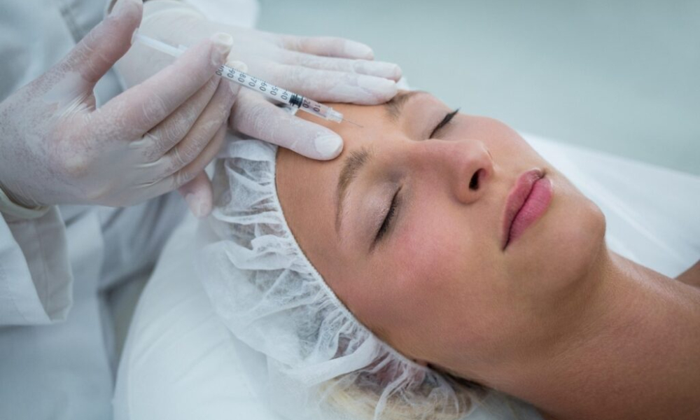 female patient receiving botox injection forehead 1 1024x683 1