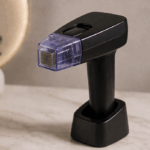 Morpheus8 RF microneedling device with needle cartridge on a marble surface representing how many Morpheus8 sessions are needed for optimal treatment results