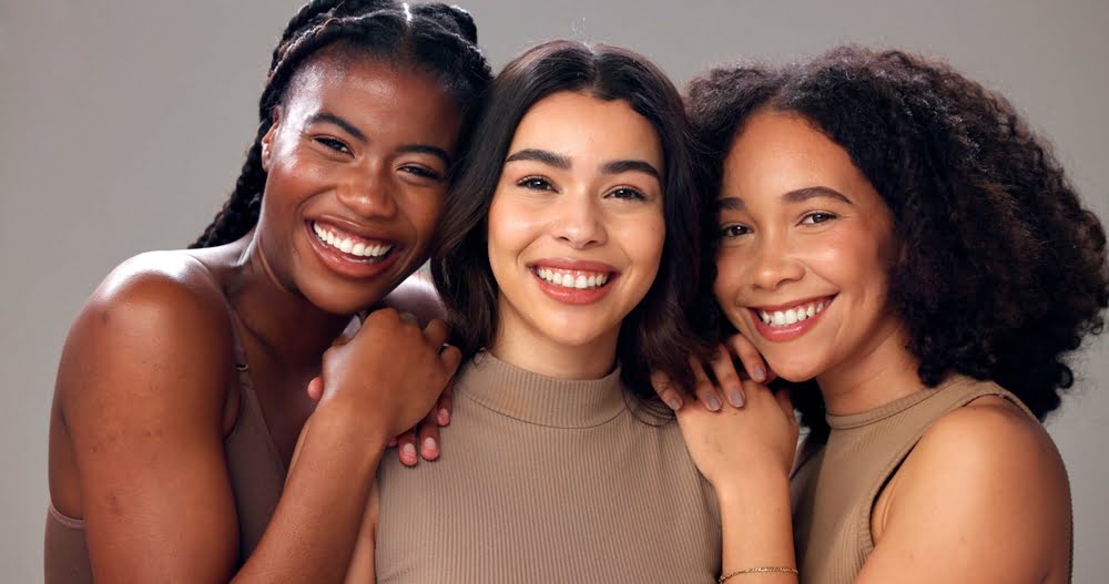 Is Morpheus8 Safe for All Skin Tones? What You Need to Know 1 Three confident women with diverse skin tones after Morpheus8 for dark skin tones treatment